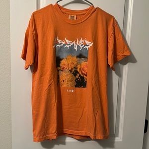 Issues orange shirt. Plain back. Unisex size medium